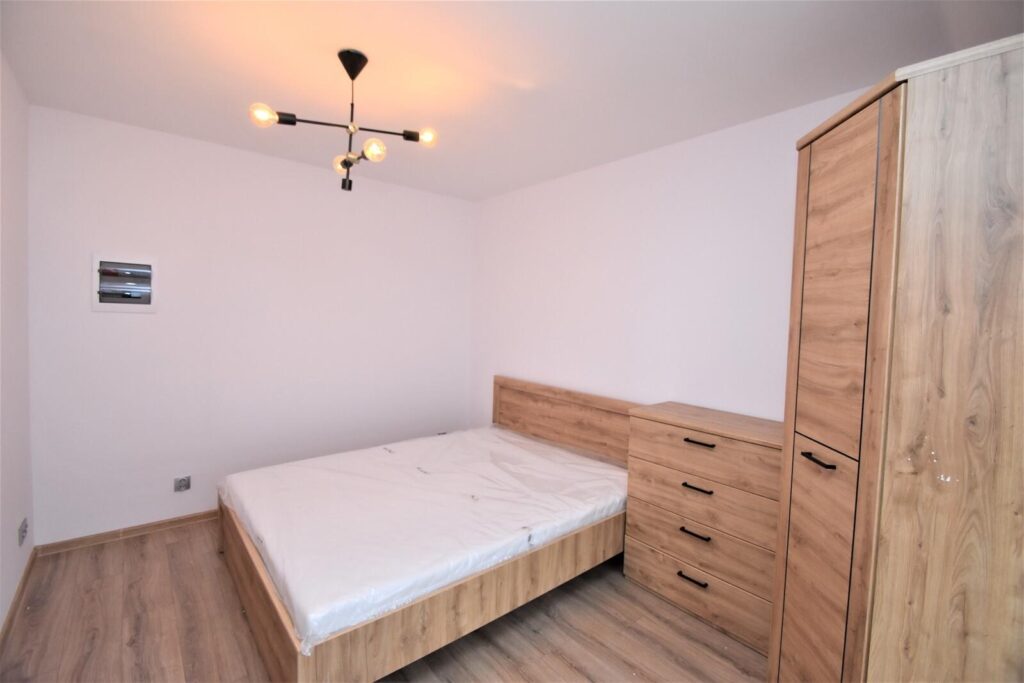 Nowoczesny 2 pokojowy apartament - zdjęcie 9