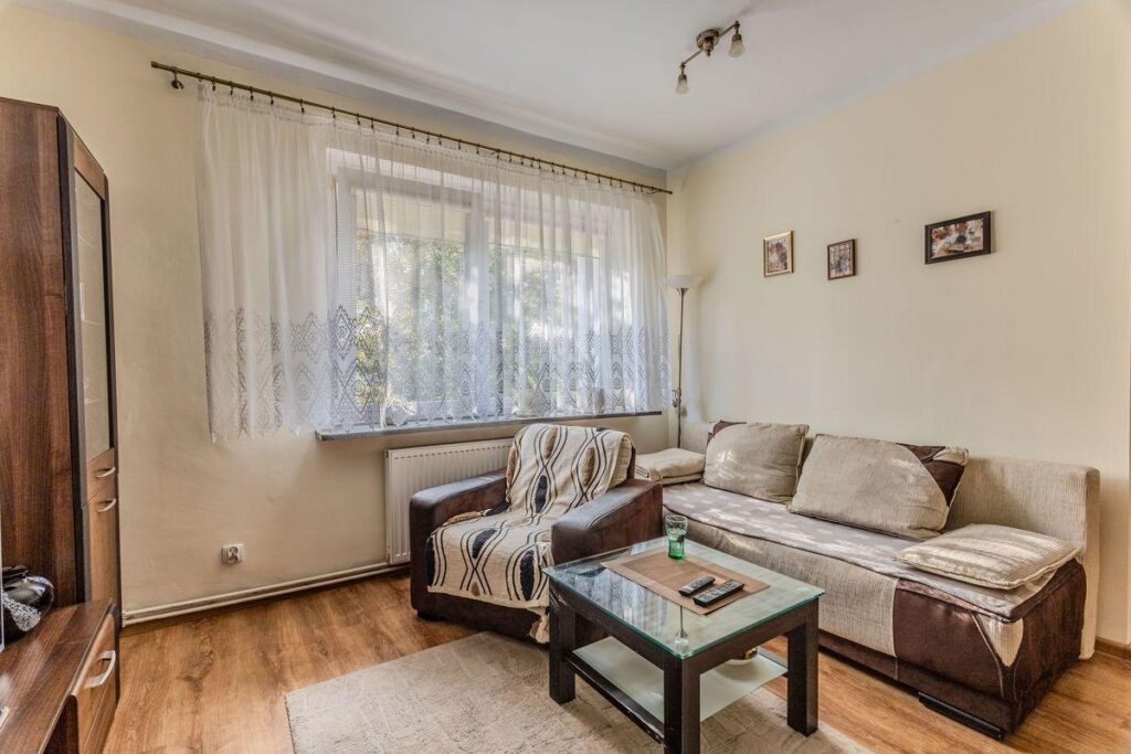 Klimatyczne dwupoziomowe mieszkanie - zdjęcie 1