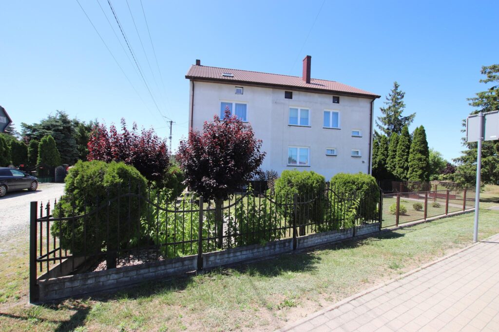 Zadbany bliźniak 90 m² z garażem i ogrodem - zdjęcie 1