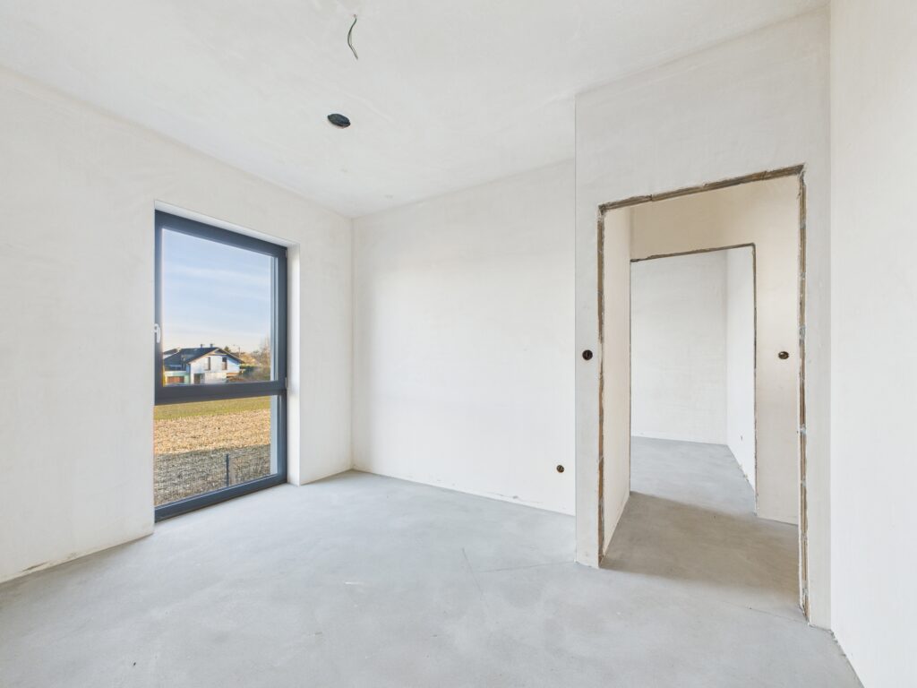 Nowoczesny dom z garażem i ogrodem. - zdjęcie 23