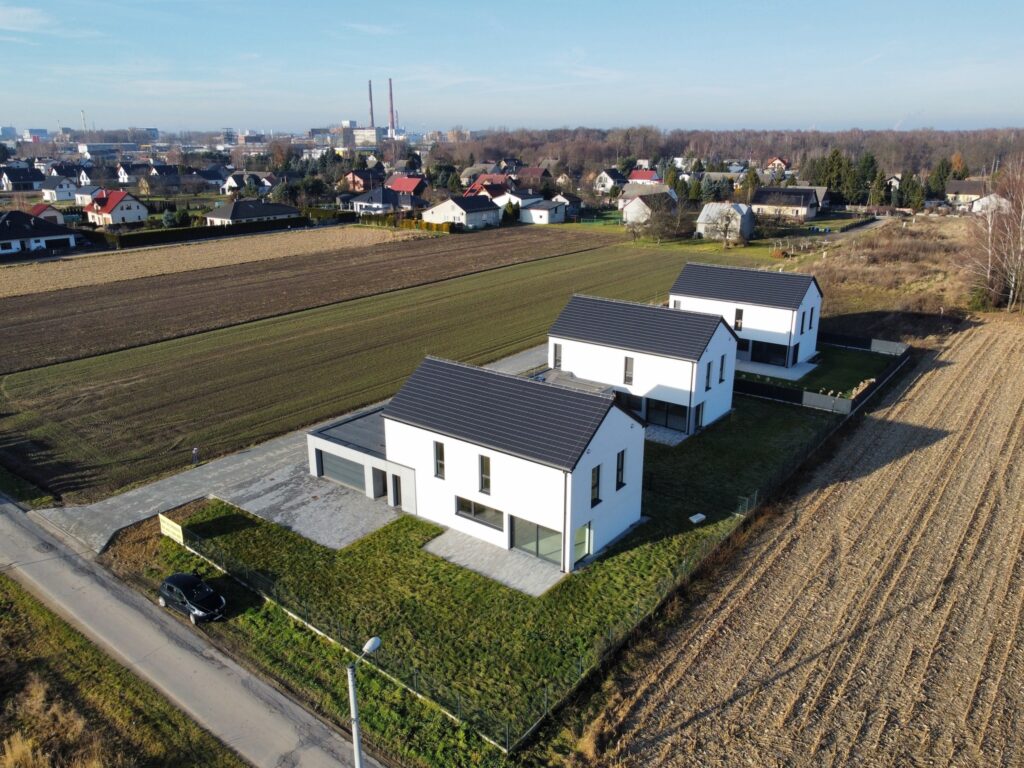 Nowoczesny dom z garażem i ogrodem. - zdjęcie 9